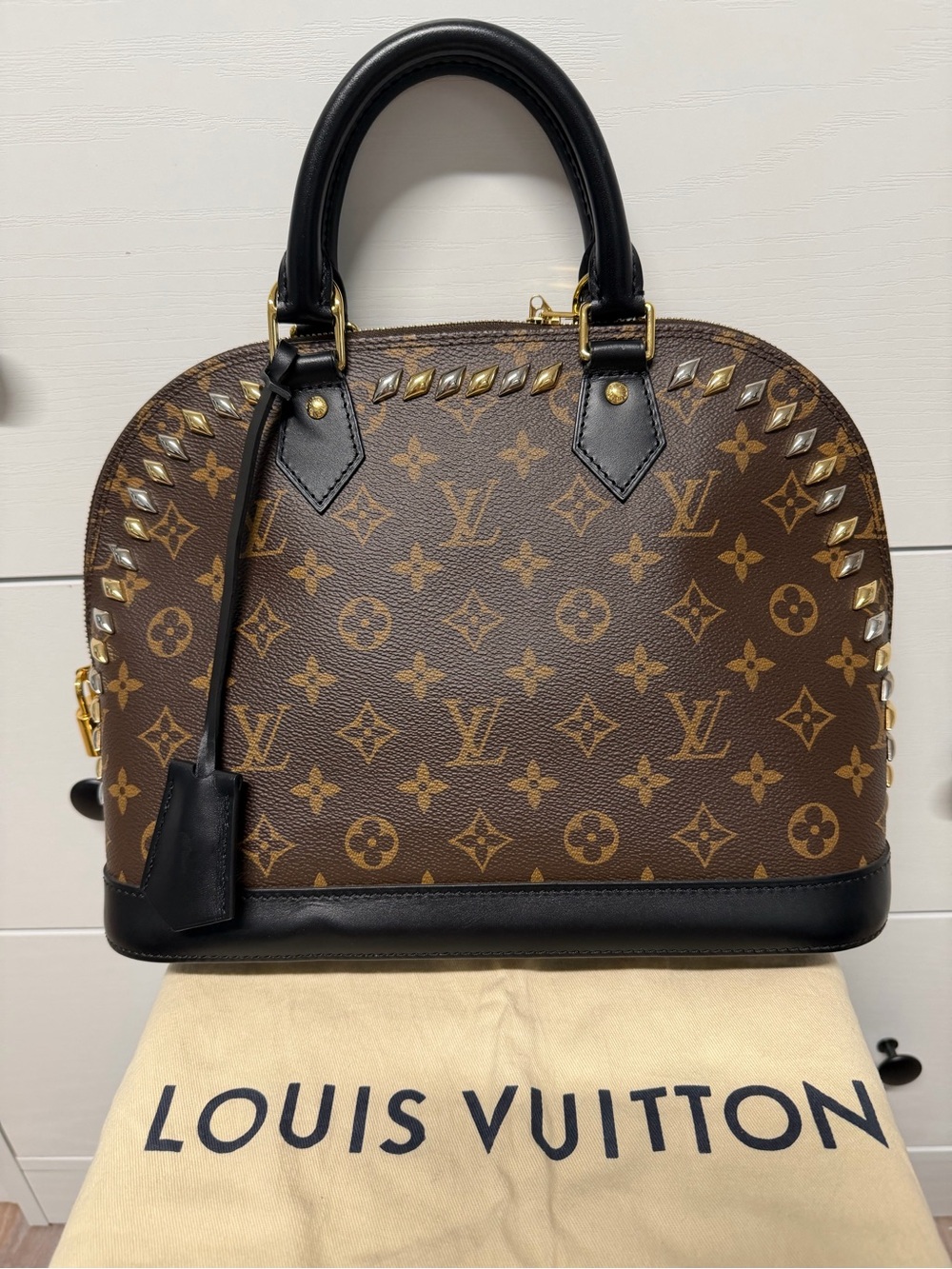 Louis Vuitton Alma PM Top Handle monogram Canvas gold Studded. Limited edition